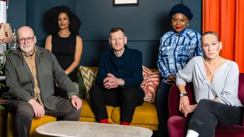 Neo Gilder/Booker Prize Foundation The five judges sitting in a row on a sofa